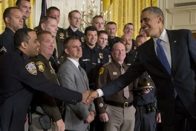 Detective Marcano shaking President Obama's hand